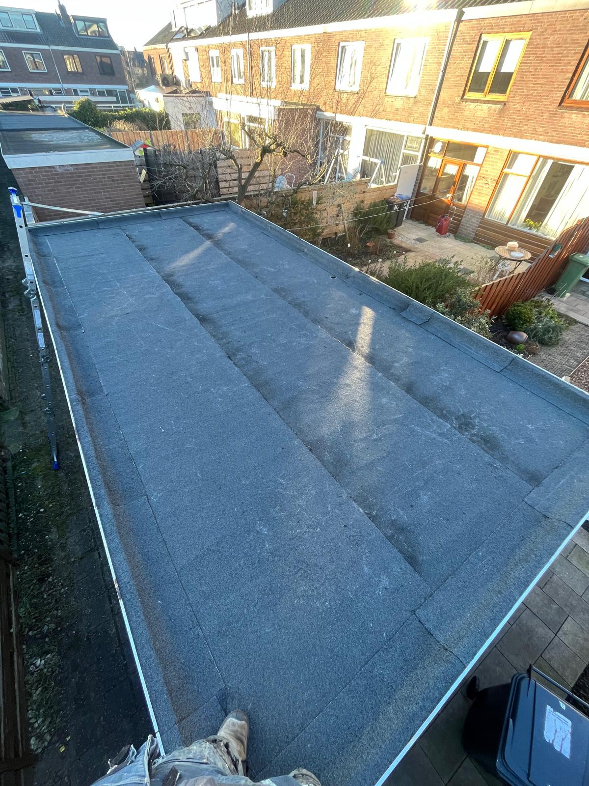 Bitumen platdak branden door Fronen Bouwbedrijf Noord-Holland